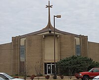 J. N. Ervin Religion and Culture Center at Jarvis Christian University; James Nelson Ervin was the first JCU president, with service from 1914 to 1938. The culture center was built after his tenure as president. J.N. Ervin Center, Jarvis Christian College IMG 0305.JPG