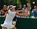 Katie Swan competing in the second round of the 2015 Wimbledon Qualifying Tournament at the Bank of England Sports Grounds in Roehampton, England. The winners of three rounds of competition qualify for the main draw of Wimbledon the following week.