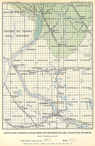 1895 map of the region of southern Lake Agassiz, showing how the lake (its bed shown in green) funneled into the Traverse Gap at Lake Traverse. The squares are civil townships and sections within those townships under the Public Land Survey System used to subdivide public lands for sale. Minnesota is to the east (right) of the watercourses; North Dakota to the north and west (upper left) and South Dakota to its south. Lake Agassiz, southern outlet.jpg