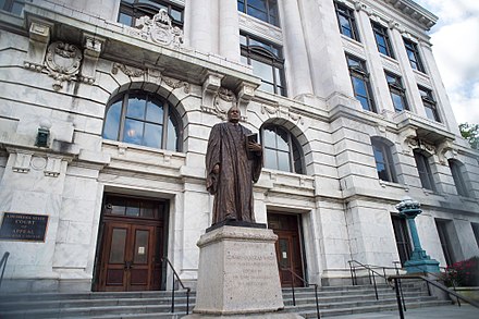 The Supreme Court Building in March 2018, Statue of Chief Justice of the US Edward Douglass White in foreground