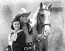 Lynne Roberts and Rogers in Billy the Kid Returns, 1938 Lynne Roberts-Roy Rogers in Billy the Kid Returns.jpg