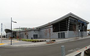 A large silver-colored railway station