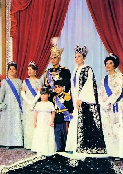Mohammed Reza Pahlavi and his wife Farah Diba upon his coronation as the Shah of Iran. His wife was crowned as the Shahbanu of Iran.