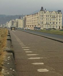 Mooragh Promenade, with the remnants of the single barbed wire fence posts that ran around the recreation area of the camp Mooragh Promenade, facing South.jpg
