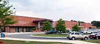 Landscape photo of Northwestern High School looking towards the main entrance of the C-Wing, with the B/G-Wing and A-Wing, in the background