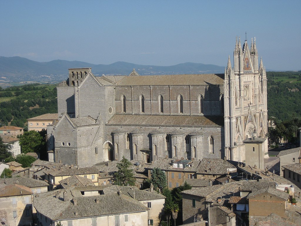 Orvieto. The Duomo di Orvieto is a large 14th century Roman Catholic cathedral situated in Orvieto in Umbria