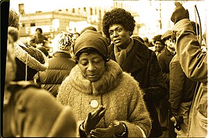 Ten busloads of Peoples Temple members attended an anti-eviction rally at the I-Hotel in January 1977. Peoples Temple members attended an anti-eviction rally at the I-Hotel in January 1977.jpg