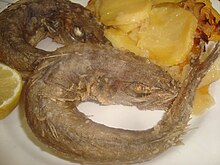 Pescadillas
are often presented biting their tails. Pescadilla frita.jpg