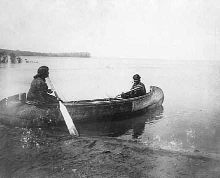 Ojibwa women in canoe, Leech Lake, 1909
