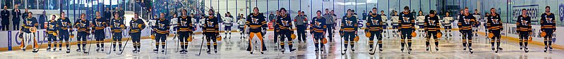 File:Players line up before the 2024 AIC - Holy Cross ice hockey game.jpg