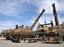 A CRARRV replacing the powerpack of a second CRARRV in Afghanistan in 2012 REME during Op Herrick 15 MOD 45162561.jpg