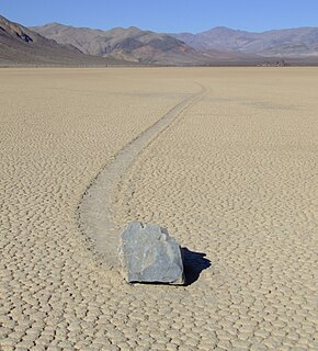 Sailing stones Geological phenomenon where rocks move and inscribe long tracks along a smooth valley floor without human or animal intervention