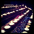 Rows of candles (5485864662).jpg