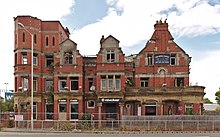 Many areas that suffered population decline from the 1970s still have signs of urban decay, such as this derelict building in Birkenhead, Merseyside. Royal Castle, Birkenhead 2020-1.jpg