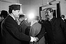 Ayub Khan and Sheikh Mujib shaking hands at the Round Table Conference in West Pakistan, 1969 Sheikh Mujib and Ayub Khan.jpg