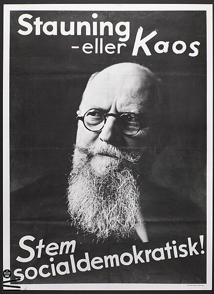Thorvald Stauning, the party's first Prime Minister (1924–1926 and 1929–1942) on his 1935 Stauning or Chaos election poster.