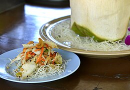 Tam maphrao on sen mi krop: a variation with soft coconut meat and deep-fried rice noodle
