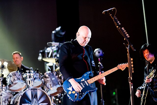 Smashing Pumpkins performing in 2019. Left to right: Jimmy Chamberlin, Billy Corgan, and James Iha