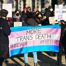 Protest at London for transgender rights with flag reading, "No More Trans Death" on the transgender flag Trans Rights 01.jpg