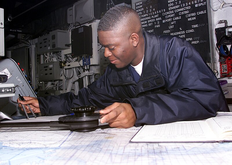 File:US Navy 030115-N-9109V-001 Quartermaster 3rd Class Richard Jones from Alexandria, La., plots a course.jpg