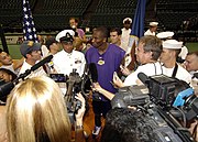 Bryant and U.S. Navy Chief Yeoman Lawrence A. Sivils answer questions from local media after his reenlistment at the University of Hawaii, Manoa's Stan Sheriff Center (7 October 2005)