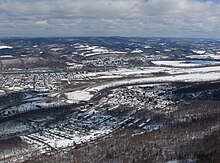 The West Branch Susquehanna Valley looking north from above the Bald Eagle Mountain ridge with Castanea and Bald Eagle Creek (in foreground) and Lock Haven, William T. Piper Memorial Airport, the West Branch Susquehanna River, and the foothills of the Allegheny Front (in background) WBSV.jpg