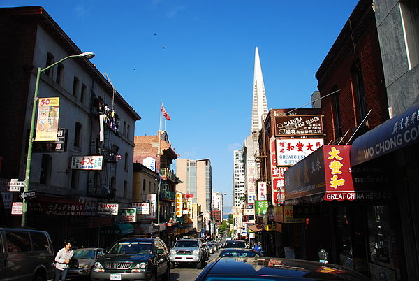 Washington Street in Chinatown with Transamerica Pyramid in the background.