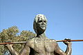 Closeup of head of statue of Yagan on Heirisson Island, Perth