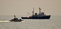 Ukrainian Navy Project 745 seagoing tug Korets and Gyurza-M-class gunboat Berdiansk (U175) in the Black Sea in 2016