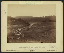 17550u View of the broken dam looking from bed of lake, Johnstown Flood.tif