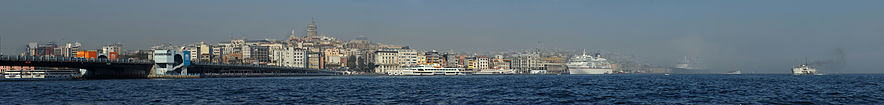 Galata Tower Istanbul Turkey, city panorama under fog.