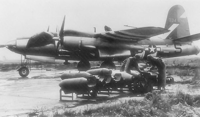 Loading bombs on a squadron B-26 Marauder