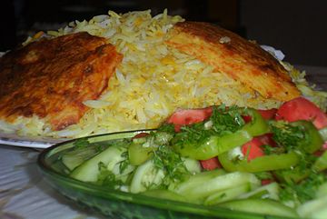 Azerbaijani plov with qazmaq (the same as Persian tahdig), served with choban salad