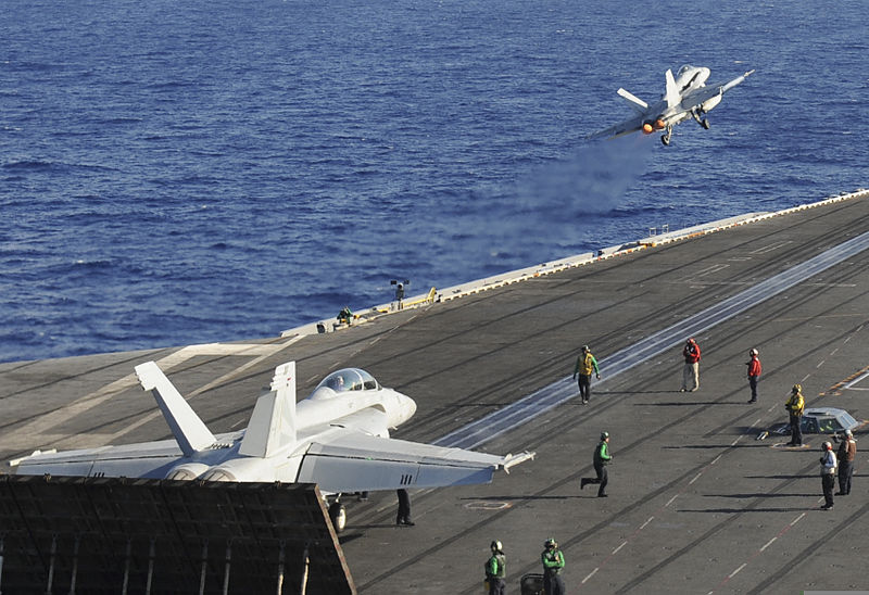 File:A U.S. Navy F-A-18F Super Hornet aircraft assigned to Strike Fighter Squadron (VFA) 154, foreground, prepares to launch from the aircraft carrier USS Nimitz (CVN 68) in the South China Sea May 22, 2013 130522-N-TX484-127.jpg