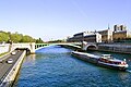 A barge and the Pont Notre-Dame, Paris 15 April 2014.jpg