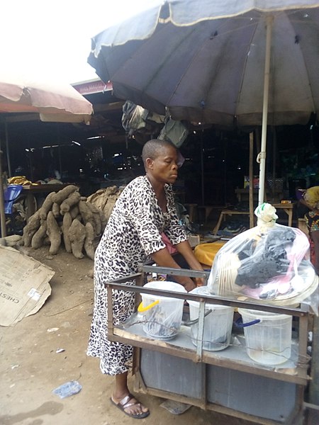 File:A woman selling food.jpg