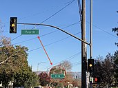 Alternating overhead street name signs in San Jose, California.jpg