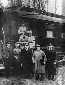 Signatories to the Armistice of 11 November 1918 with Germany, ending WWI, pose outside Marshal Foch's railway carriage Armisticetrain.jpg