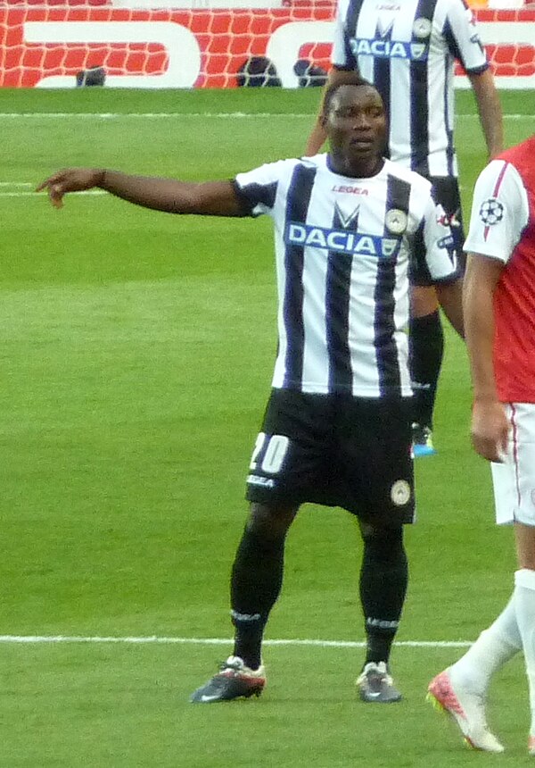 Asamoah playing for Udinese in the 2011–12 UEFA Champions League play-off versus Arsenal F.C.