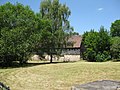 Side building and barn of a former three-sided farm