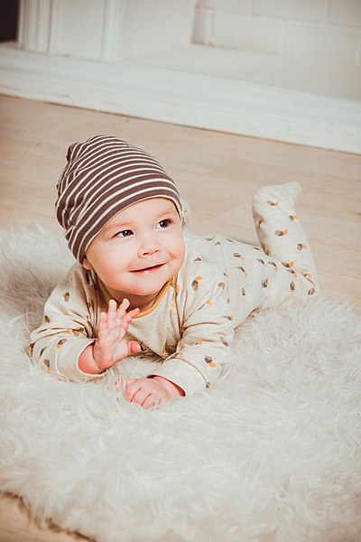 File:Baby wearing hat and babygrow.jpg