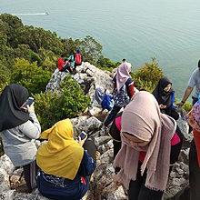 Batu Putih peak is popular among local weekend hikers. Batu Putih summit.jpg