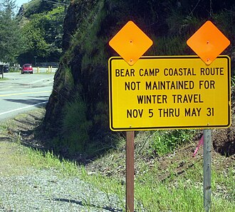 Warning sign near the west end outside Gold Beach, Oregon Bear camp road warning sign P4368c.jpeg