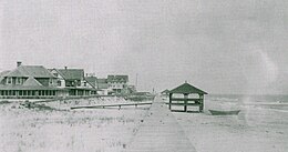 A view looking north of the original, surface-level boardwalk at Bethany Beach that was completed in 1903. It was destroyed by a storm in 1920. Bethany Beach boardwalk pre-1920.jpg