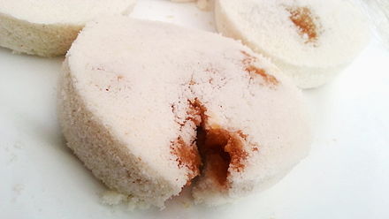 Bangladeshi style rice cake, originally known as Bhapa Pitha, eaten with molasses as a sweetener