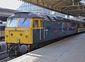 This is an OK photograph, but it's into the sun a little bit so the side of the loco is in shadow. The underframe (which is an important technical part of the loco) is hidden by the platform. If you didn't know, how could you tell it was a Co-Co?