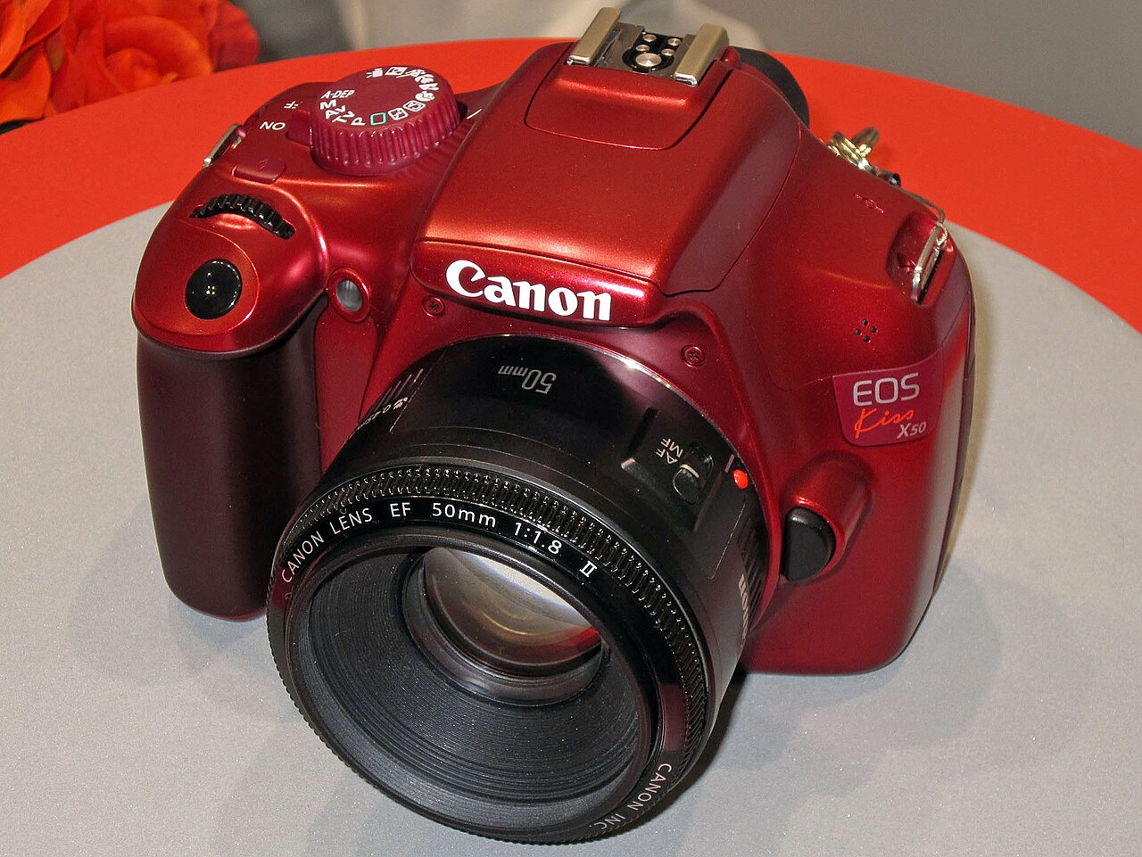 File:Canon EOS Kiss X50 red.jpg - Wikimedia Commons