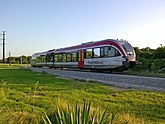 Capital MetroRail Red Line approaching Lakeline Station, Austin, Texas..jpg