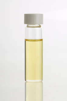 Carrot seed (Daucus carota) essential oil in clear glass vial CarrotSeedEssOil.png
