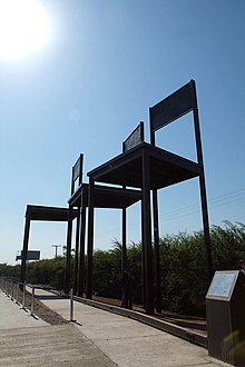 A monument inaugurated in 2006 to commemorate the Caso Degollados, the slaying by police forces of three Communist Party members in 1985. Caso degollados.jpg